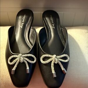 Copper Key Black Mules with Silver Bow Accent